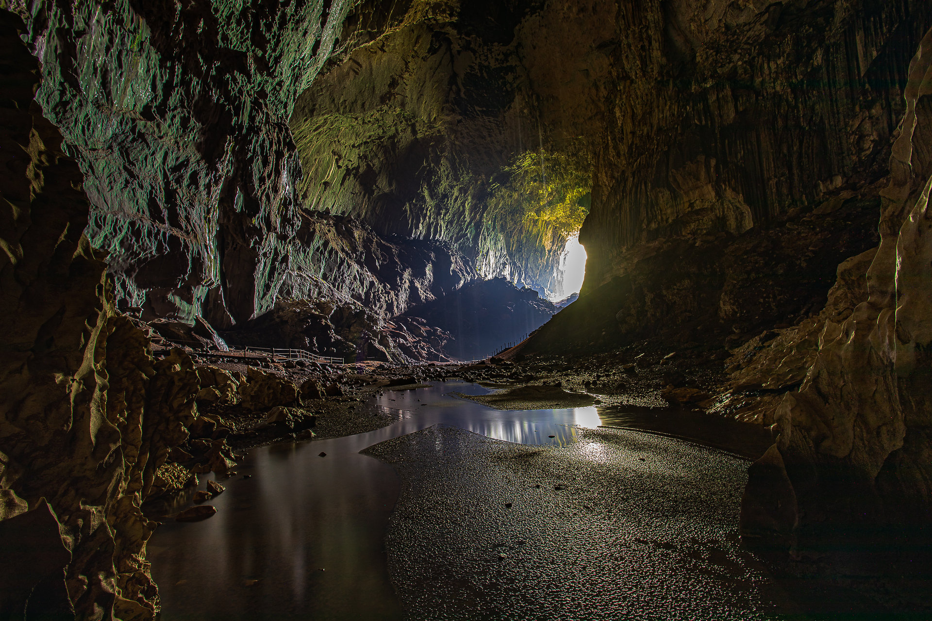 Cave mouth opening onto the Sarawak rainforest