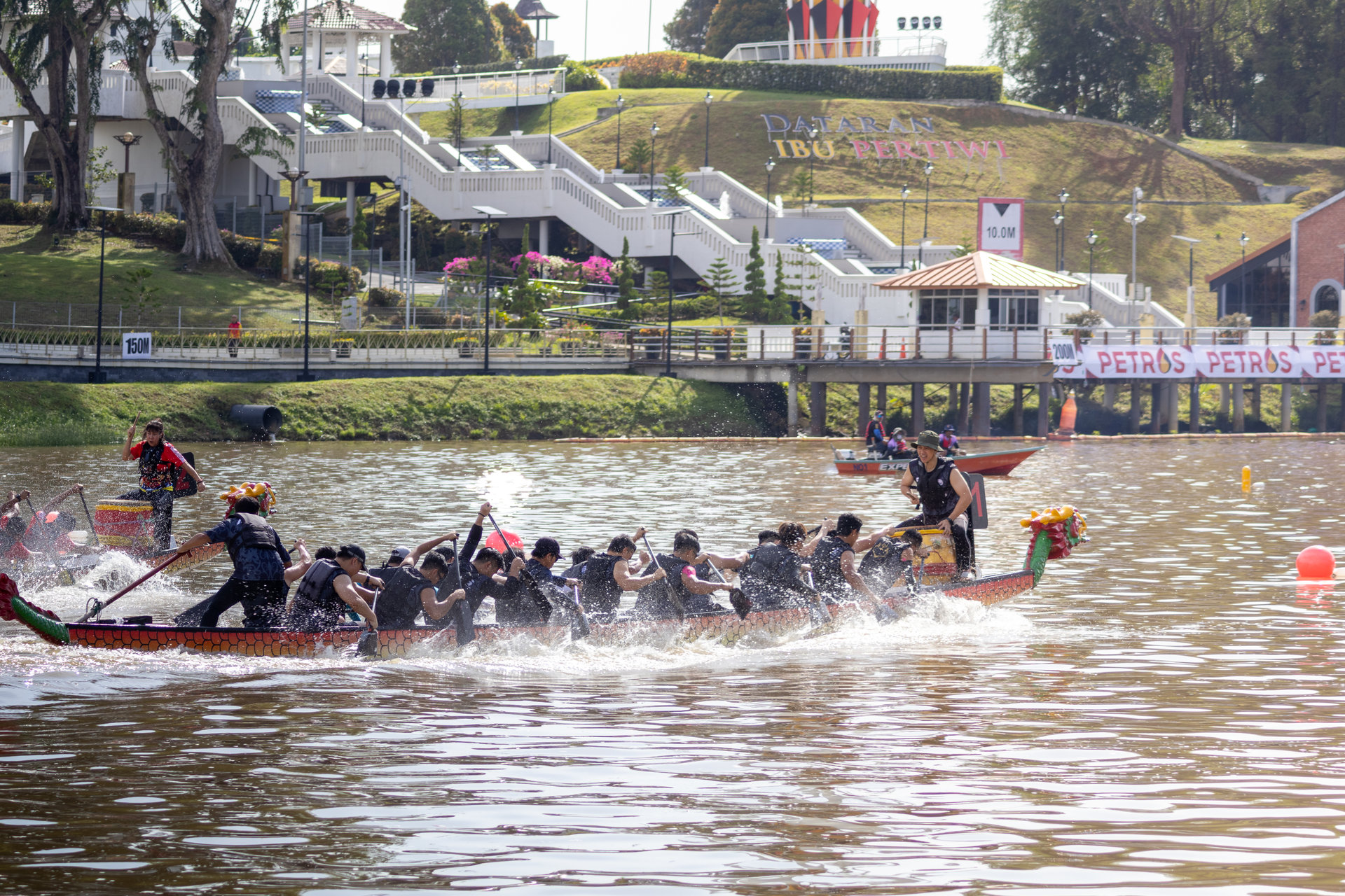 Dragon boat crews racing on the Sarawak River, Kuching