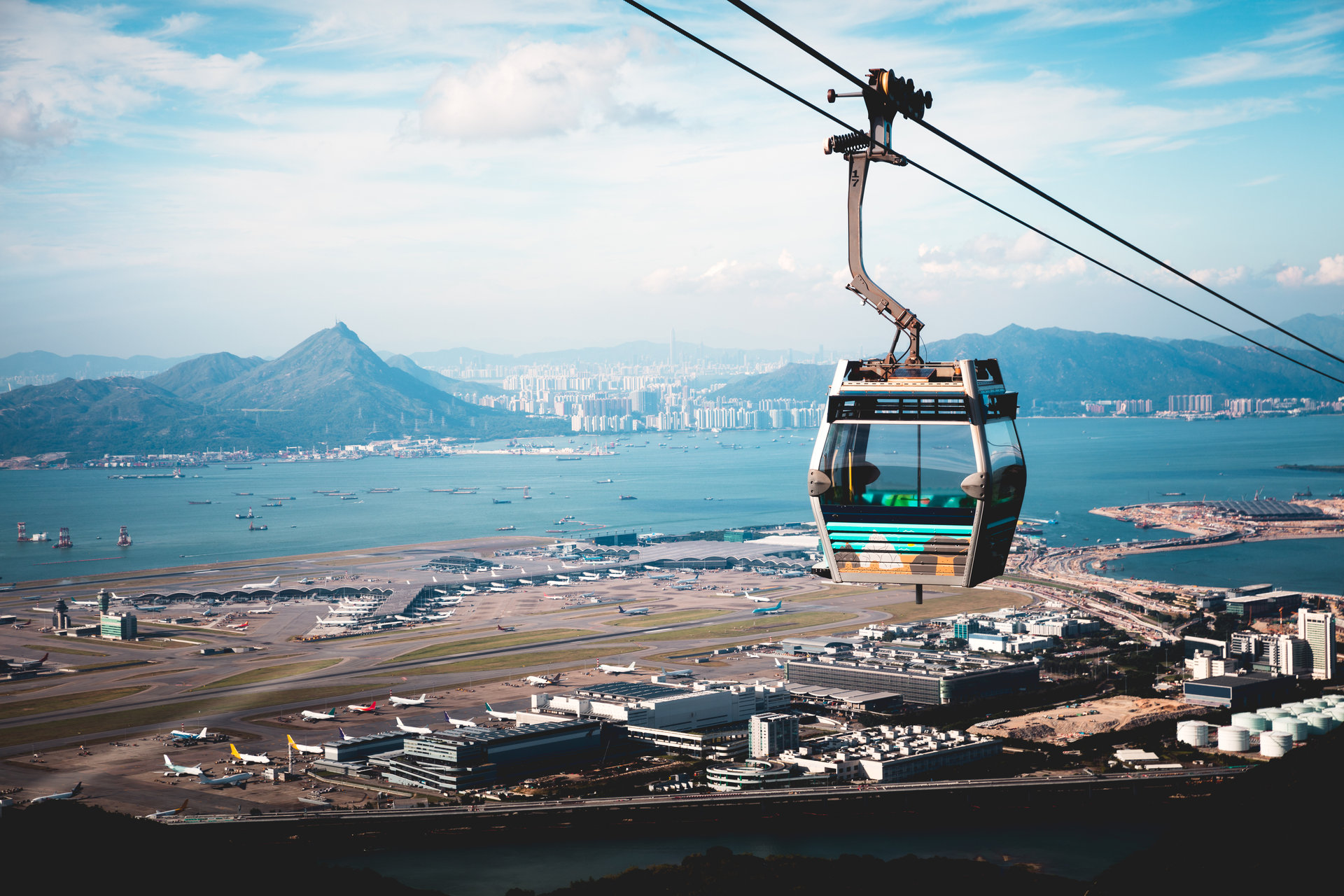 A Ngong Ping 360 cable car above Tung Chung bay